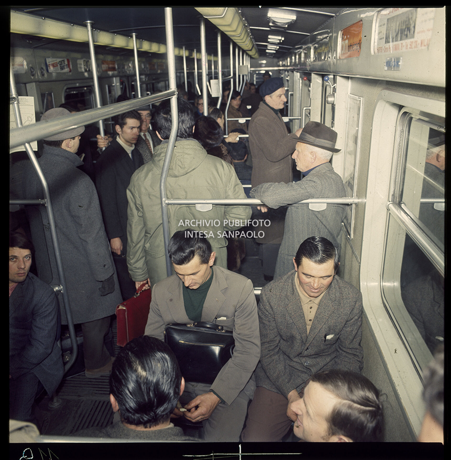 Passengers on the underground train in Milan