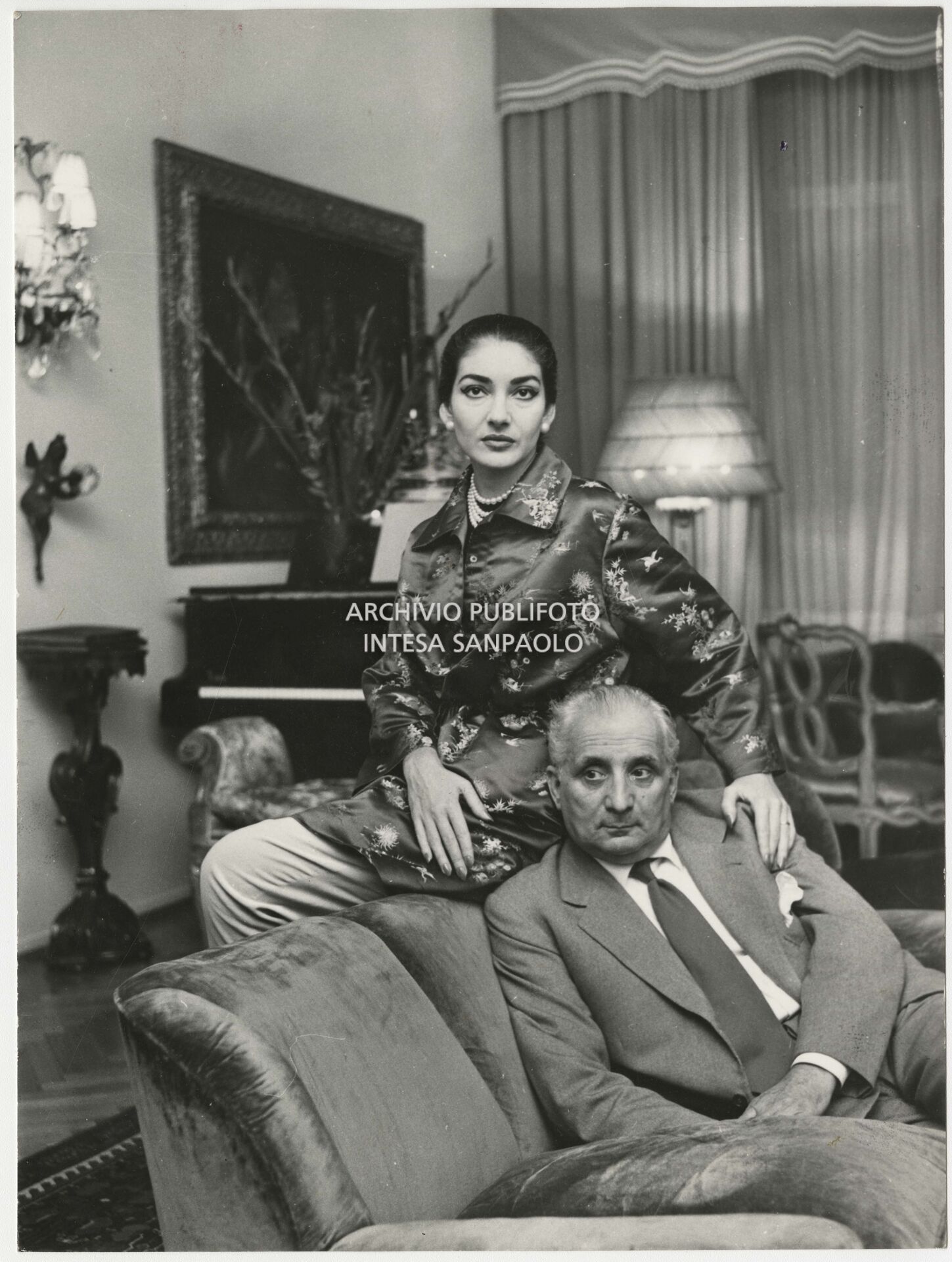 Maria Callas with her husband Giovanni Battista Meneghini at home