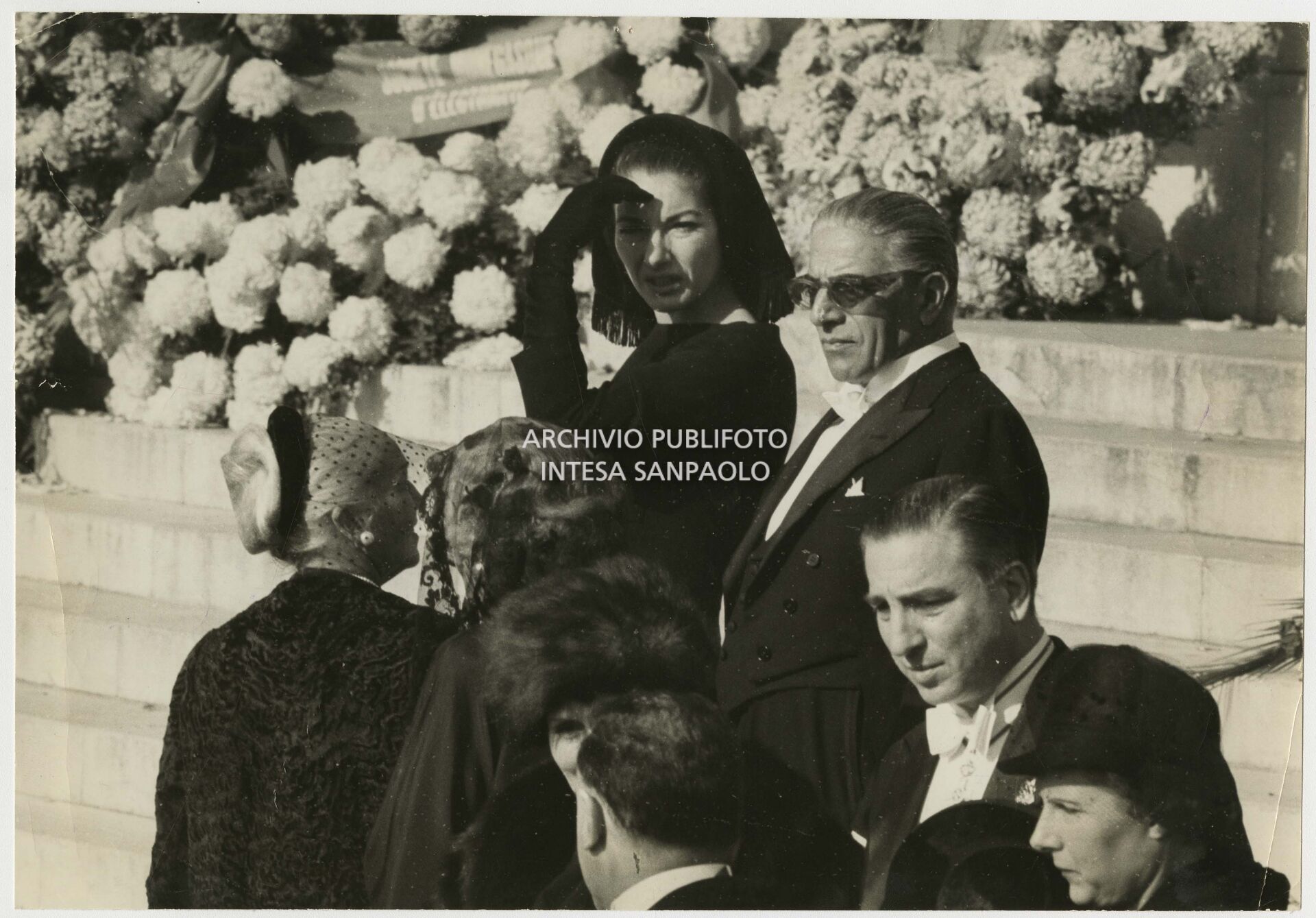 Maria Callas and Aristotele Onassis at the funeral of Prince Pierre de Polignac, father of Prince Rainier III of Monaco, in Monaco