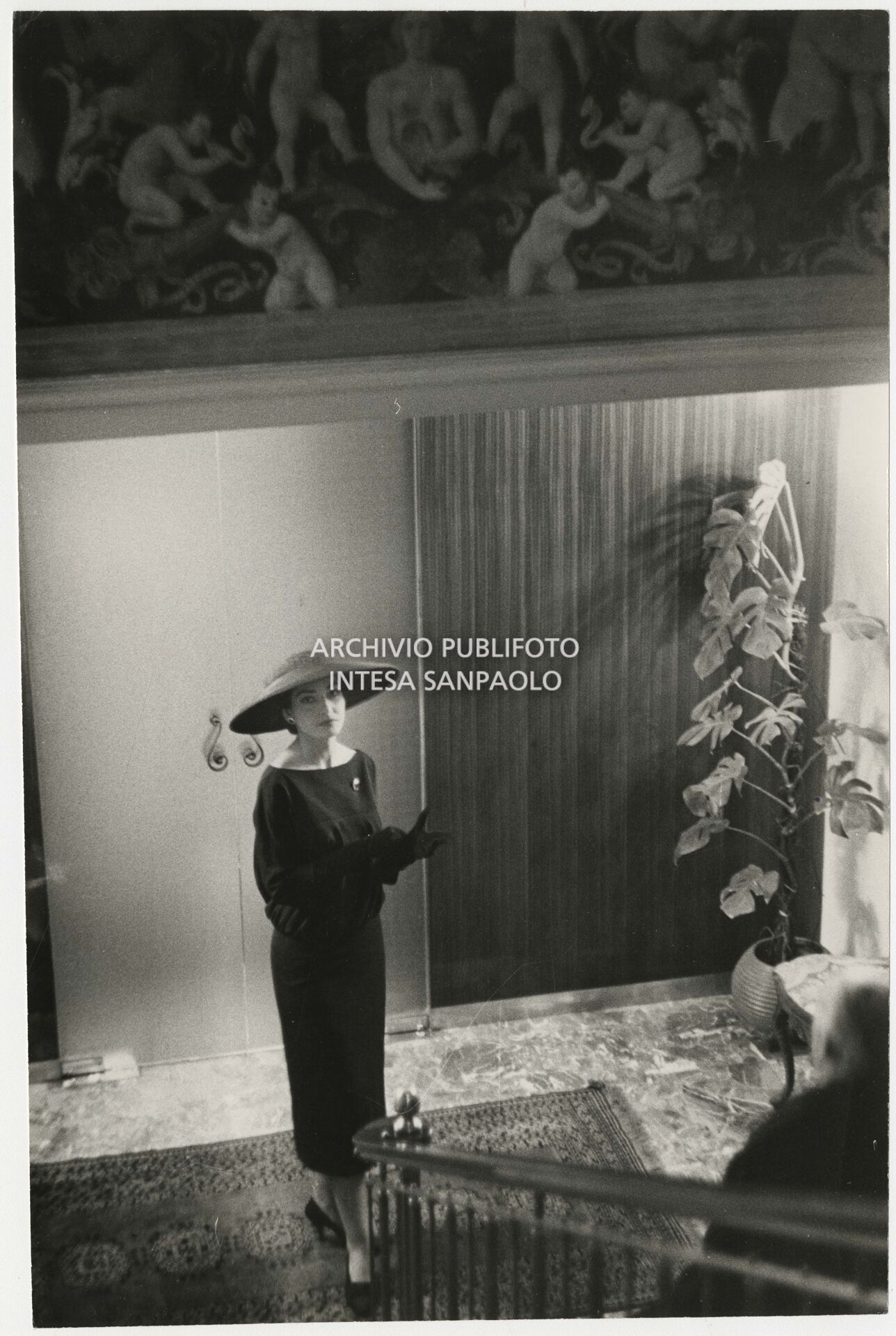 Maria Callas pictured in her home, dressed by Biki