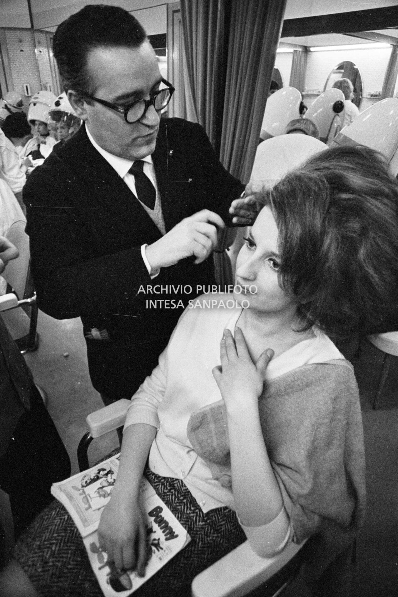Mina getting her hair done during the 11th Sanremo Festival