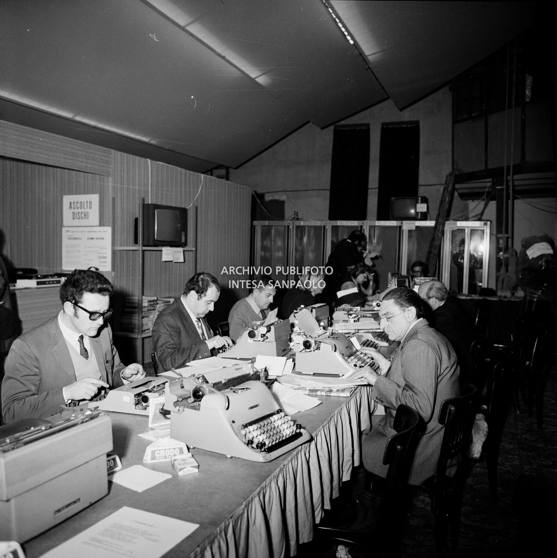 The Press room with a station for listening to songs
				and telephone booths at the 21st Sanremo Festival