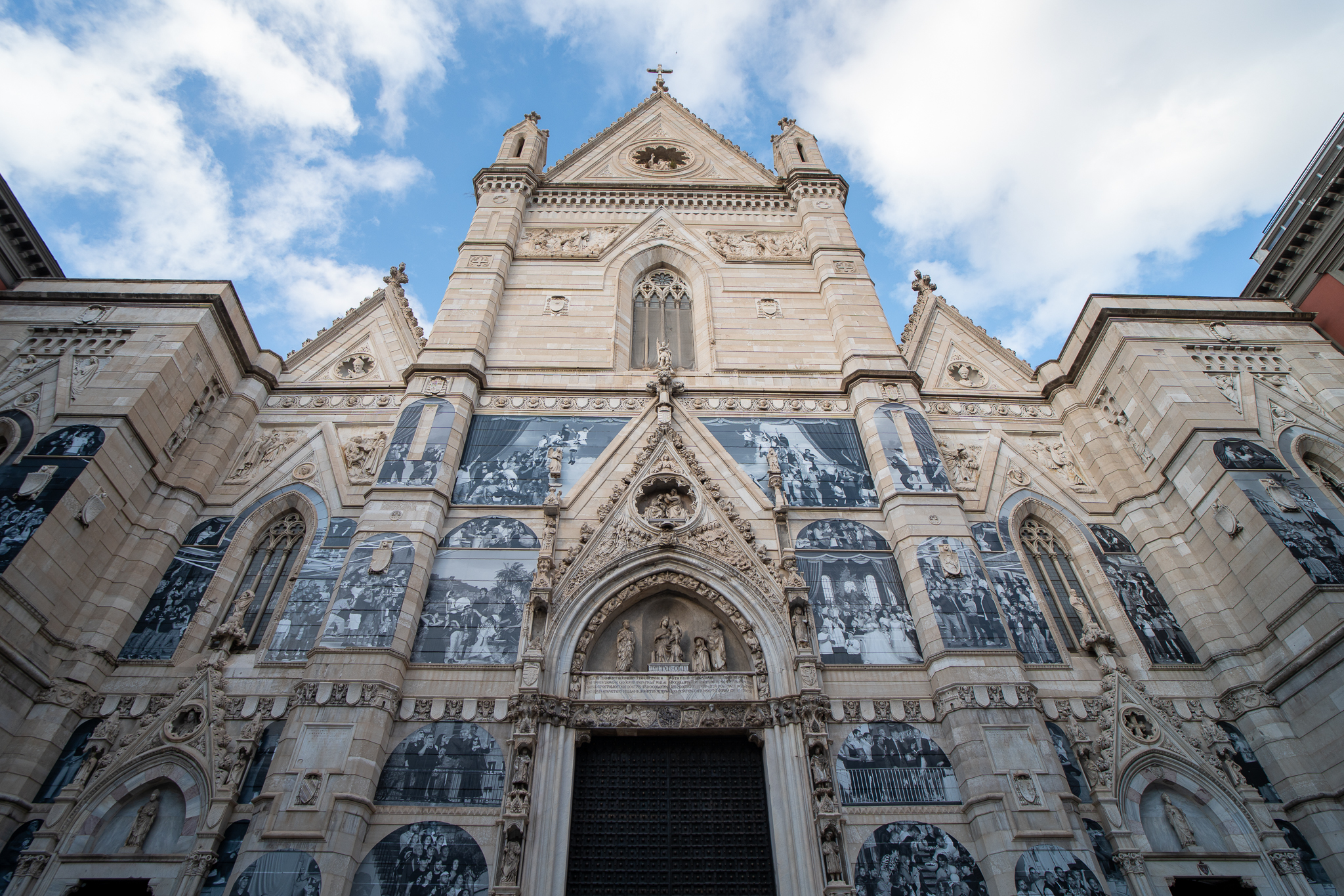 Photographs of the project "Chronicles" by JR in Naples, duomo