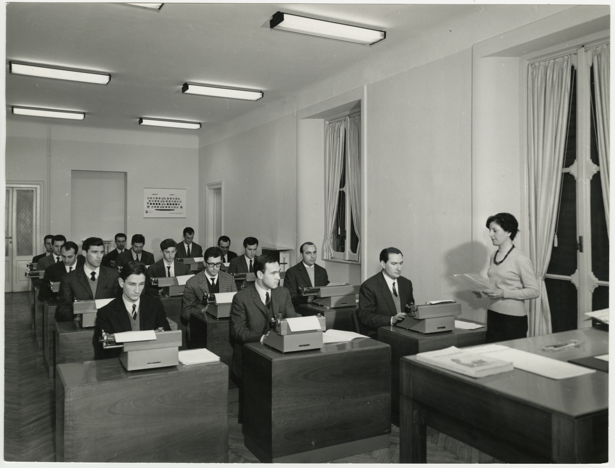 Training course for the staff of Cassa di Risparmio delle Provincie Lombarde, teaching them to use an Olivetti typewriter, 1965